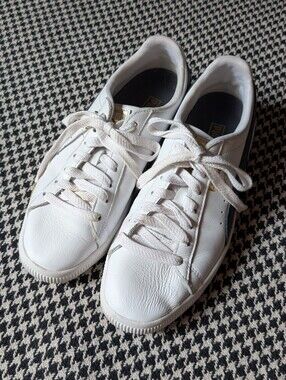 Puma Clyde Core white leather sneakers with gold accents